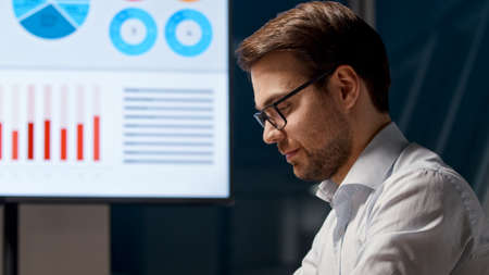 Young professional man at work in office meeting roomの写真素材