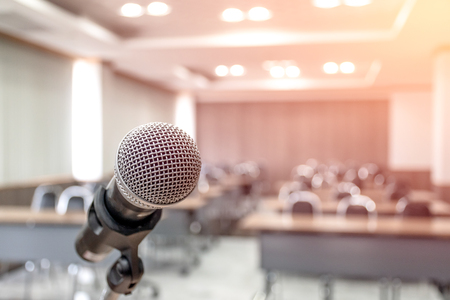 Microphone on abstract blurred of speech in seminar roomの写真素材