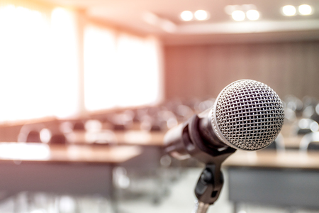 Microphone on abstract blurred of speech in seminar roomの写真素材