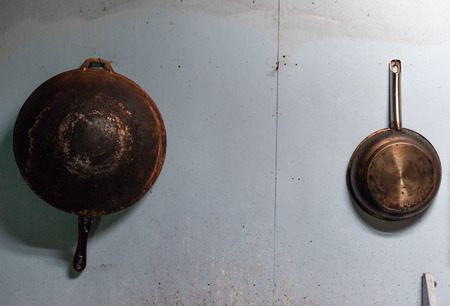 Old pan in the kitchenの写真素材