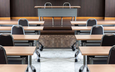 Seminar room with a speaker table in the middle of the stageの写真素材