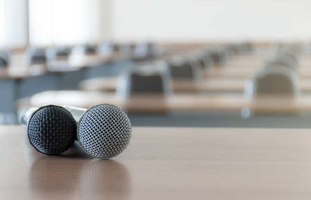 Close up microphone on the speaker table in seminar roomの写真素材
