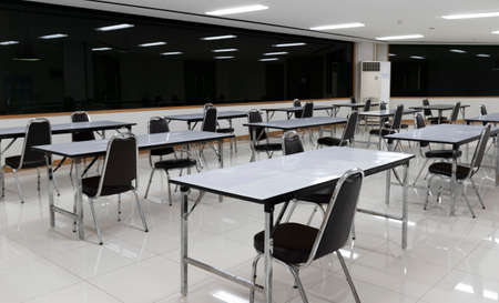 The dining room social distancing table layout to protect against the coronavirus (covid-19)の写真素材