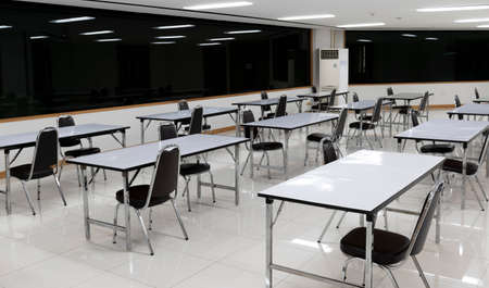 The dining room social distancing table layout to protect against the coronavirus (covid-19)の写真素材