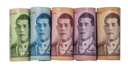 30 October 2020 Nonthaburi Thailand Colorful Thai banknote rolls sorted by value isolated on white backgroundのeditorial素材