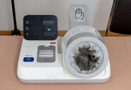 Automatic blood pressure monitor on tableの写真素材