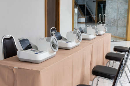 Automatic blood pressure monitor on tableの写真素材