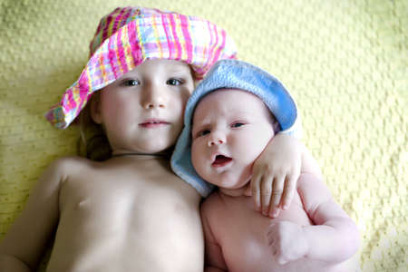 Two sisters on the yellow plaidの写真素材