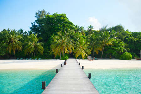 Scenic road from the pier to the island. Luxury tropical resortの写真素材