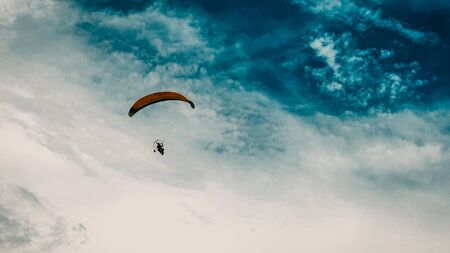 Playing paragliding on the beach when the weather is sunnyの写真素材