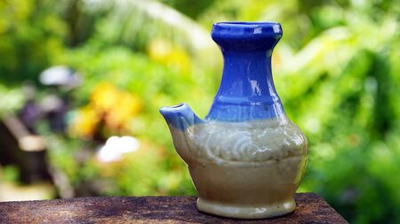 Close up the ceramic bottle on the tableの写真素材