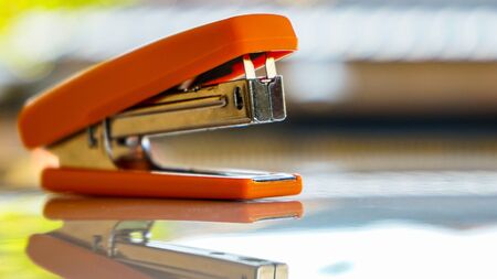Close up of the stapler on the tableの写真素材