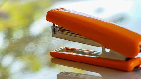 Close up the stapler on the tableの写真素材