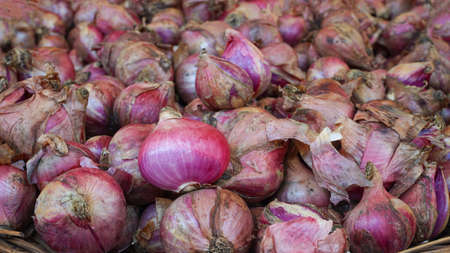 Close up the shallots in the basket