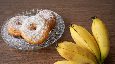 Close up of donuts and bananasの写真素材