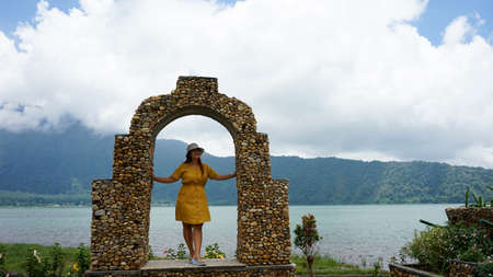 A woman by the lakeの写真素材