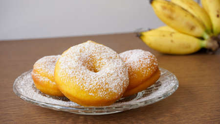 Close up of donuts and bananasの写真素材