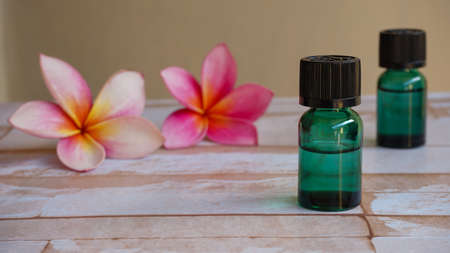 Close up of spa massage oil bottle on the tableの写真素材