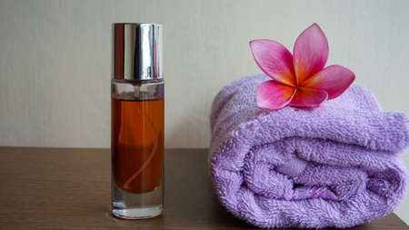Close up of spa massage oil bottle on the tableの写真素材