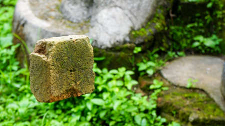 Close up of hands and bricksの写真素材