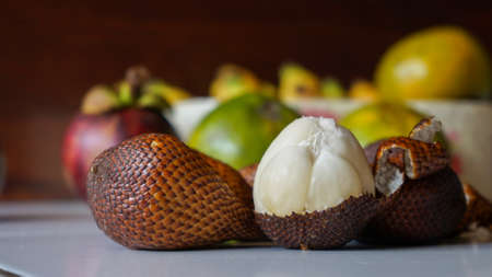 Close up of tropical fruit on the tableの写真素材