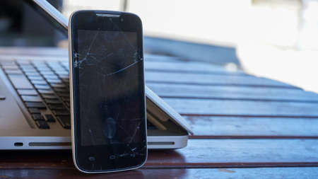 Close up of mobile phone on tableの写真素材