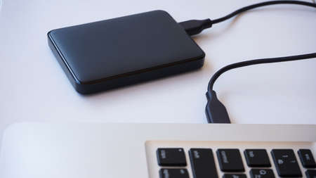 Close up of the external hard drive on the tableの写真素材