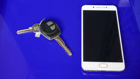 Close up of mobile phone on tableの写真素材