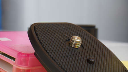 Close up part of camera tripodの写真素材