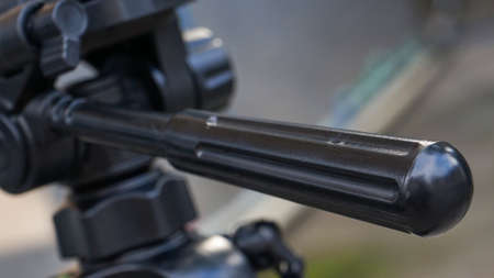 Close up part of camera tripodの写真素材