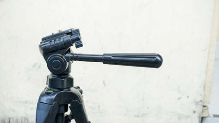 Close up part of camera tripodの写真素材