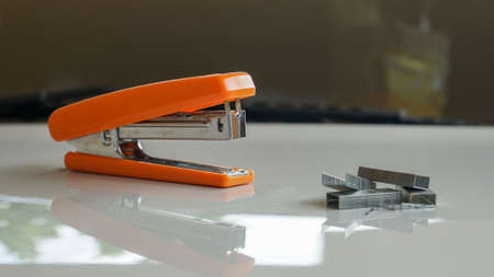 Close up of staples on the tableの写真素材