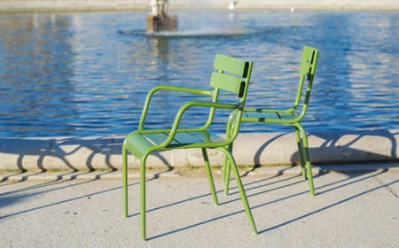 chairs close to waterの写真素材