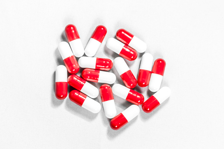 Red and white pillsの写真素材