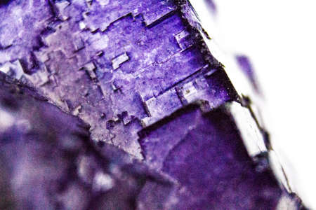 Natural facet fluorite stone closeup on white backgroundの写真素材