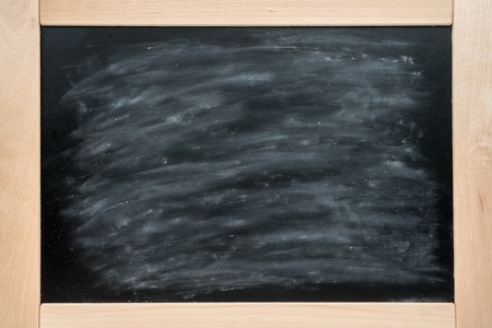 Blackboard. Background school board in wooden frame covered with chalkの写真素材