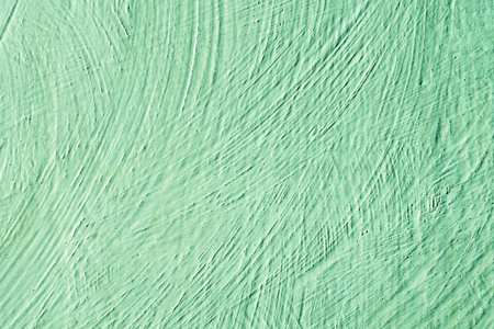 Background color green. Abstract painted decorative background. Wall painted in green texture