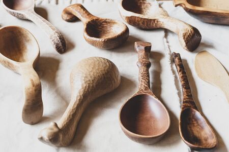 Wooden spoon. Spoons of wood handmade at the fair. Vintage backgroundの写真素材