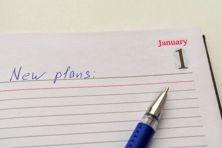 Notepad with the date of 1 January. The concept of recording new plans for the futureの写真素材