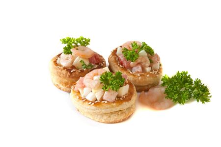 Volauvents filled with fresh shrimp salad isolated on whiteの写真素材