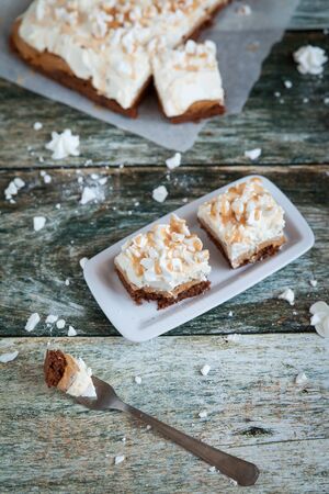 Homemade cake with dulce de Leche, solt caramel, cream and meringuesの写真素材