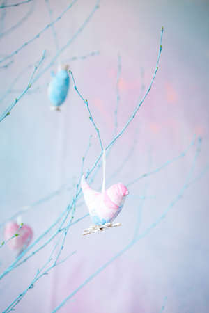 Spring pastel decor with fabric hearts and birds