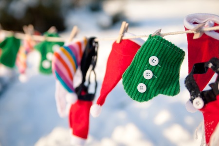 Christmas garland with small Santa clothes.の写真素材