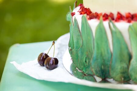 Delicious wedding cake decorated with berries