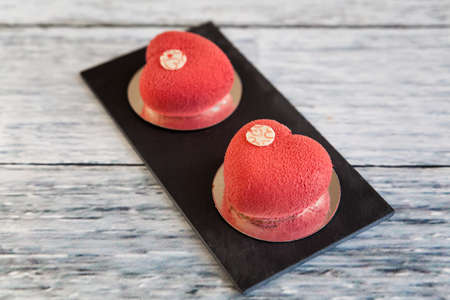 Red mousse heart cakes