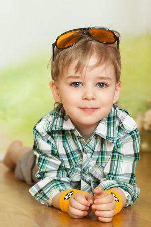 Cute boy portrait in a Easter studioの写真素材