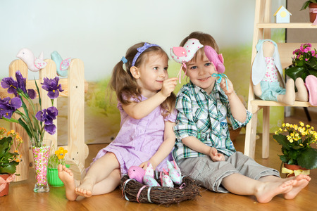 Cute children plaing in a Easter studio