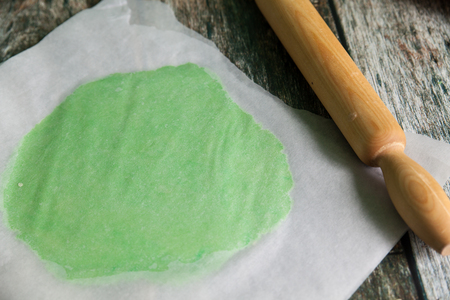Preparing shortbread dough, rolled green shortcrust pastry doughの写真素材