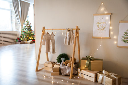 Cosy kid's room decorated for Christmas holidays. Beautiful children's playroom with wooden furnitureの写真素材