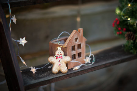 Christmas holiday garden. Festive winter season, backyard decorated for holidays. Gingerbread Man...